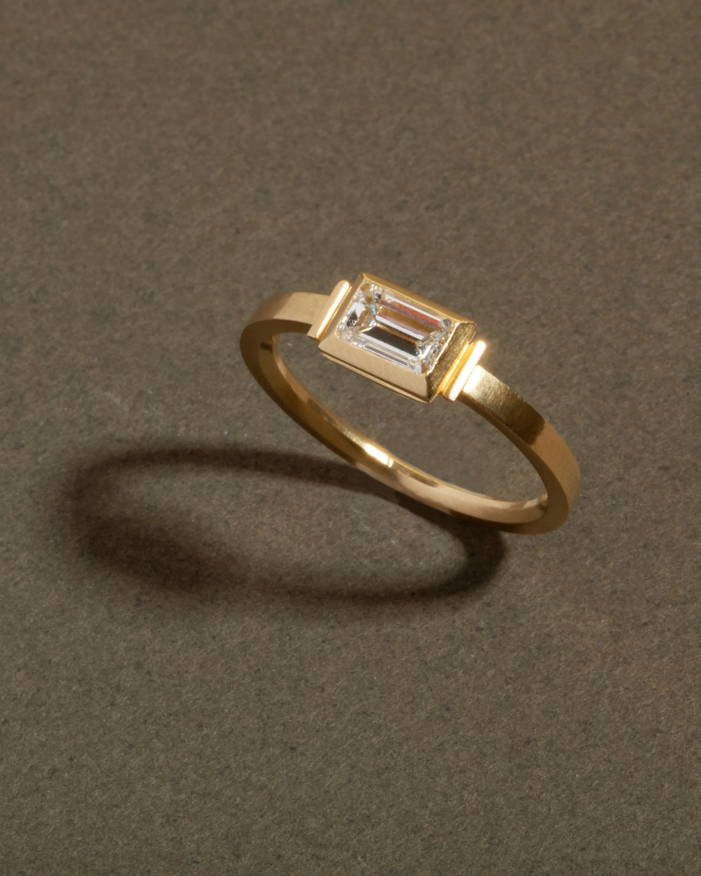 Bell & Bird Bezel Set Baguette Diamond Ring