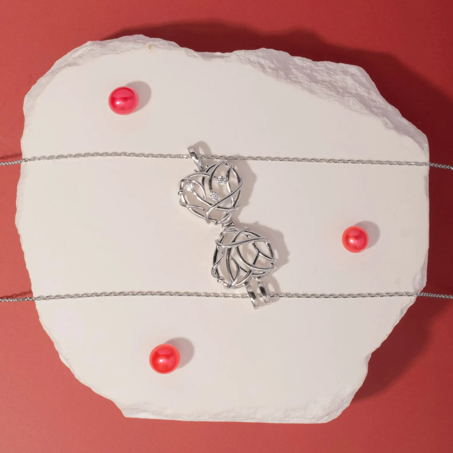 CAPTURED HEART PEARL CAGE