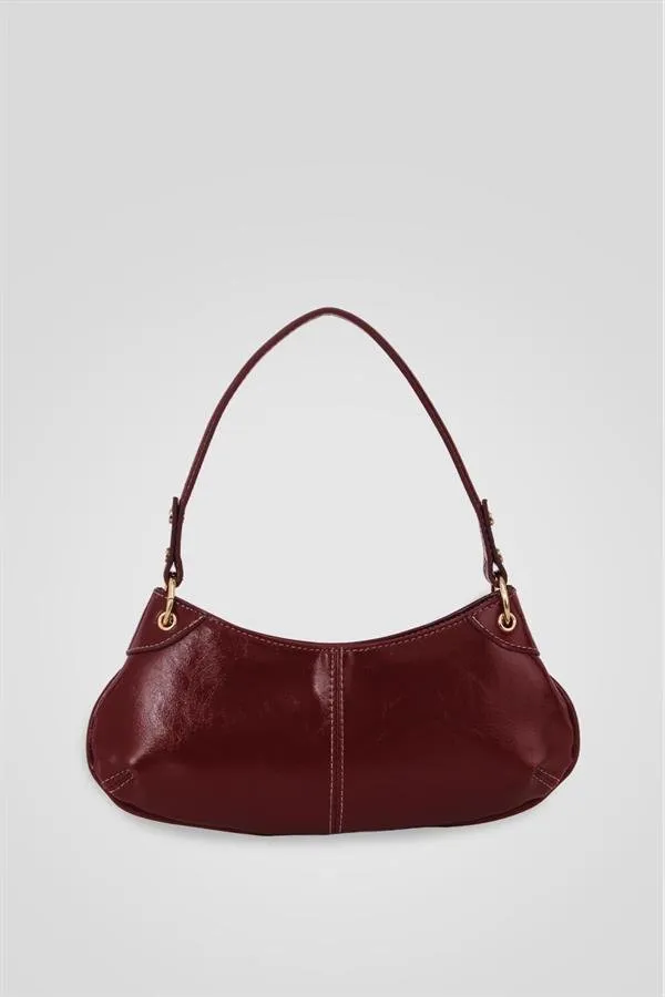 <tc>Sac à main pour femme Leroy en couleur bordeaux avec anse.</tc>