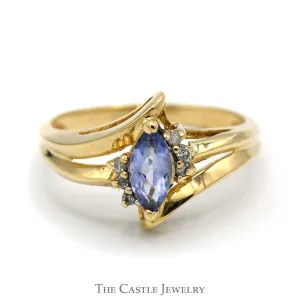 Marquise Shaped Tanzanite Ring with Diamond Accents and Split Shank Sides in 14k Yellow Gold
