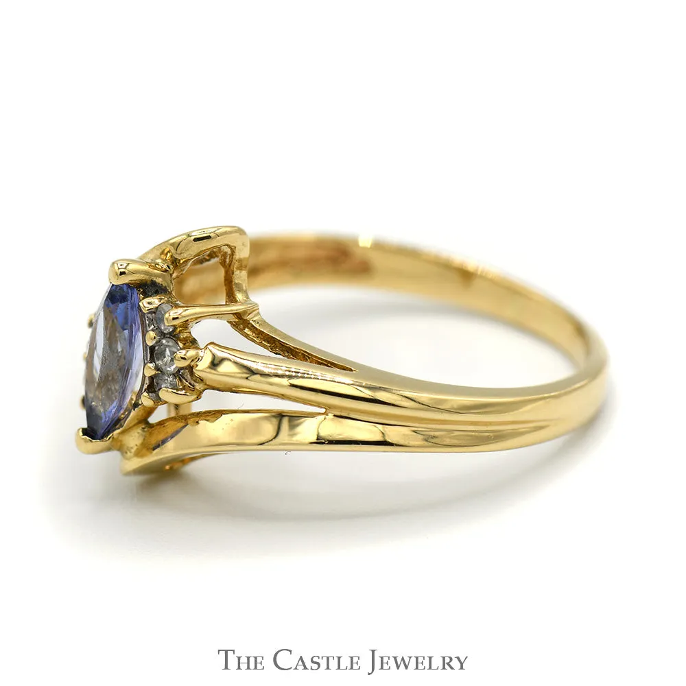 Marquise Shaped Tanzanite Ring with Diamond Accents and Split Shank Sides in 14k Yellow Gold