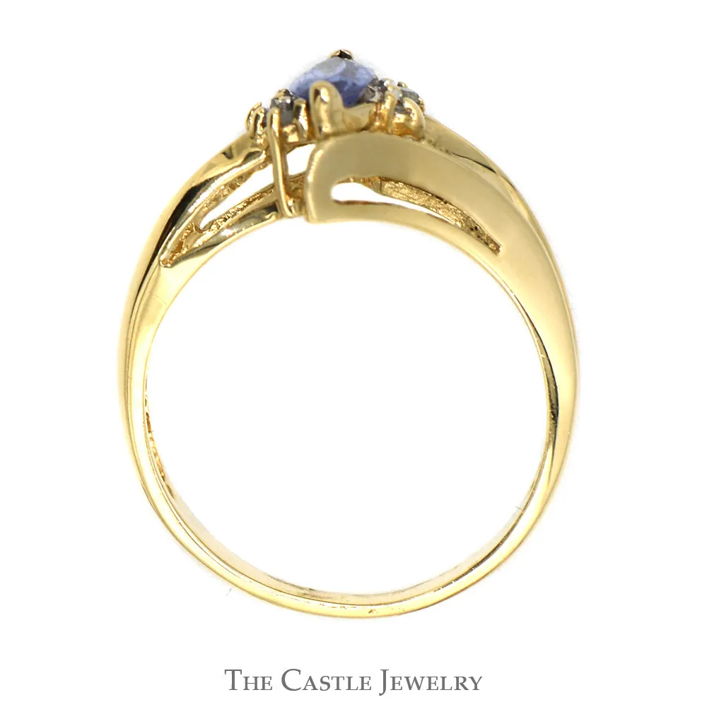 Marquise Shaped Tanzanite Ring with Diamond Accents and Split Shank Sides in 14k Yellow Gold