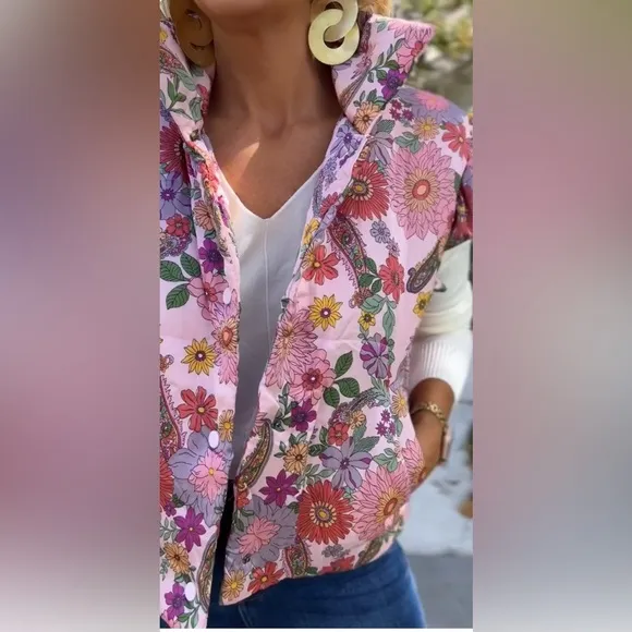 Merci - Flutter Sleeve Floral Print Puff Vest!