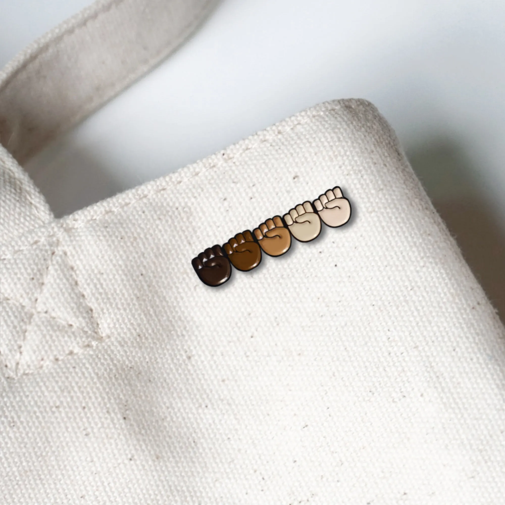 Stand Together Raised Fists Emoji Lapel Enamel Pin